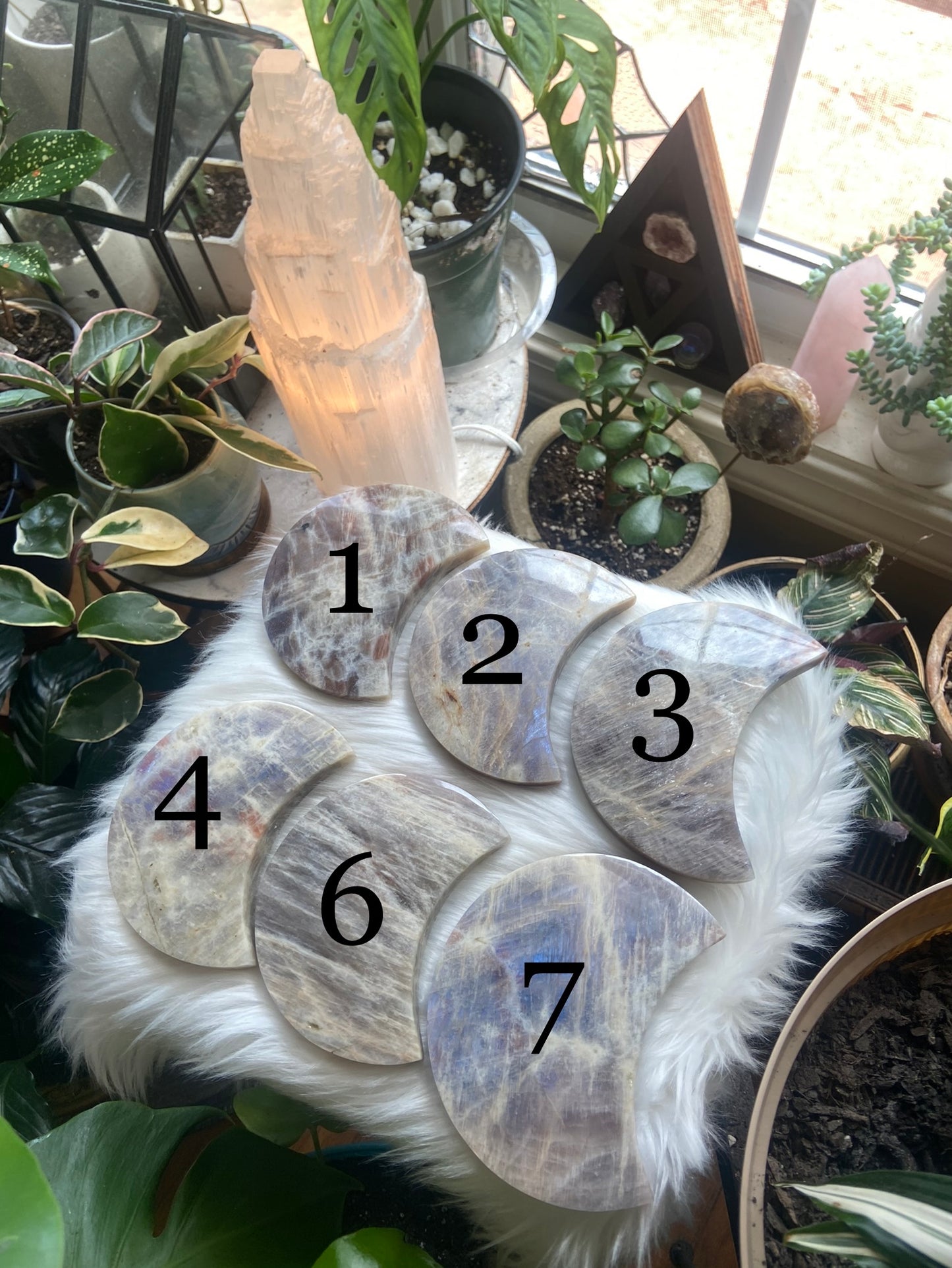 Carved Moonstone and Sunstone (Belomorite) with stand