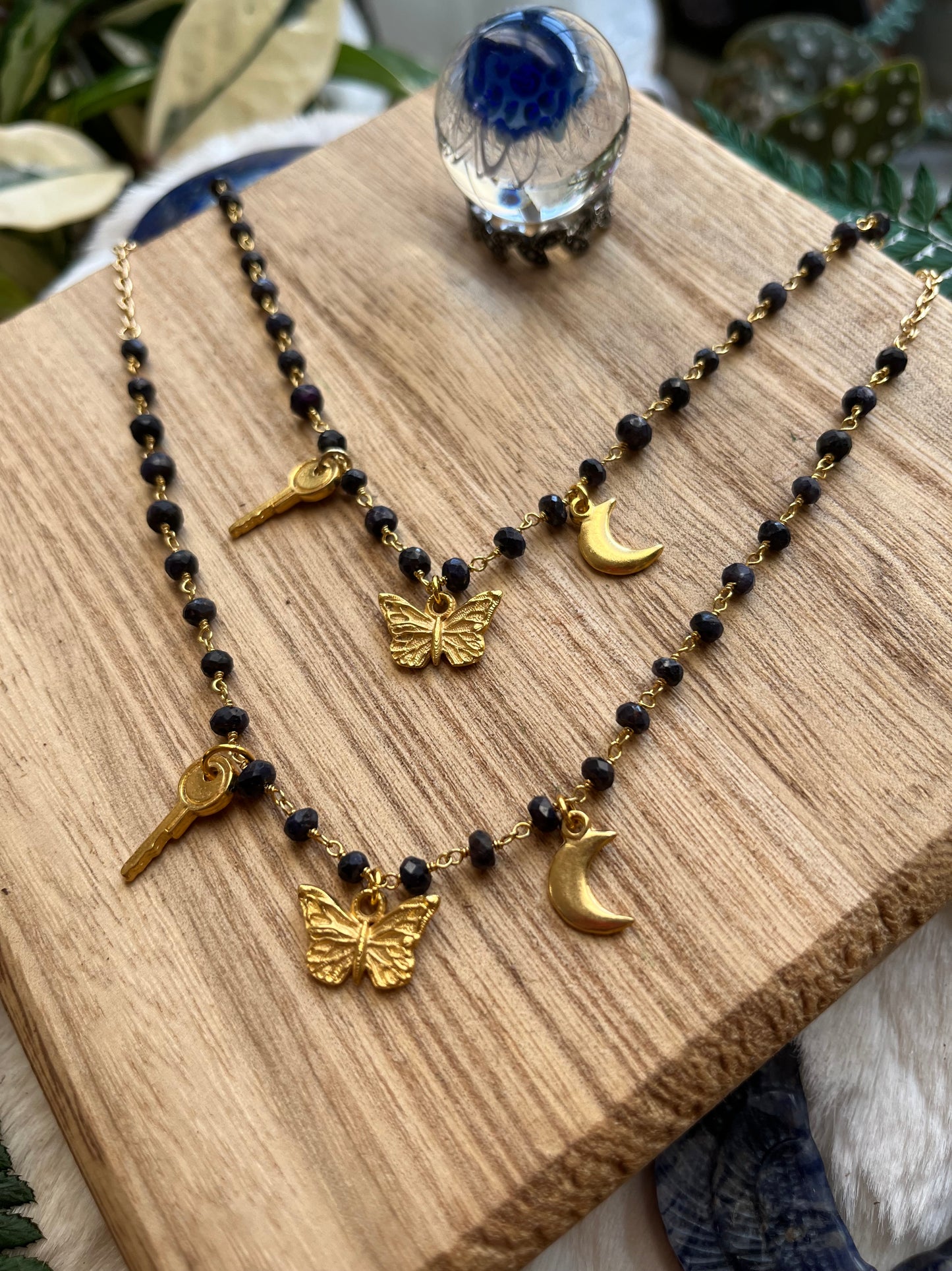 Sapphire & Gold Charm Necklace — Key, Moon & Butterfly