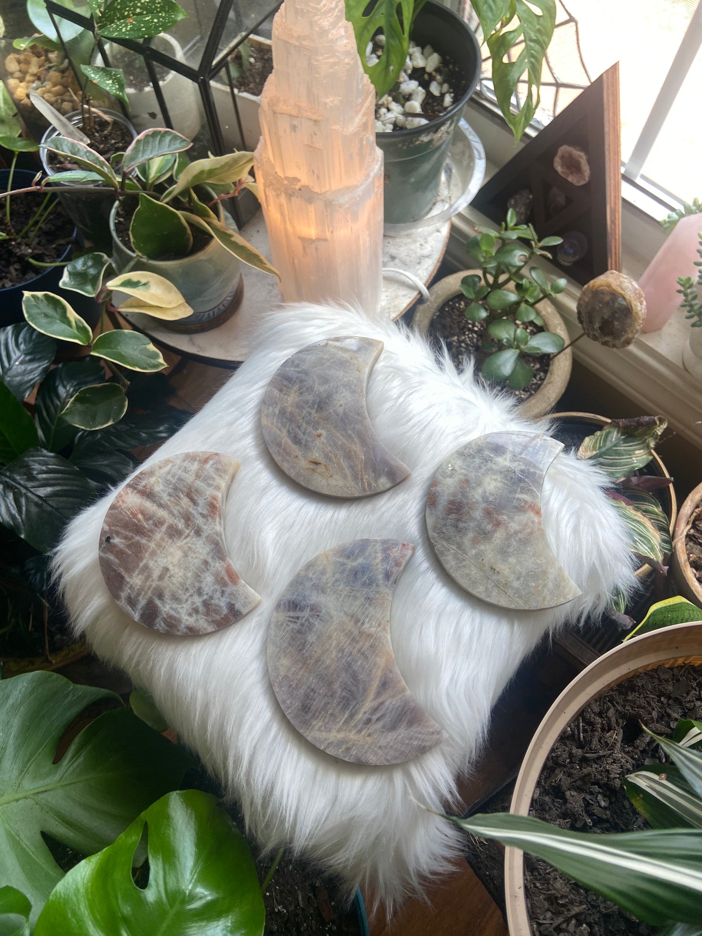 Carved Moonstone and Sunstone (Belomorite) with stand