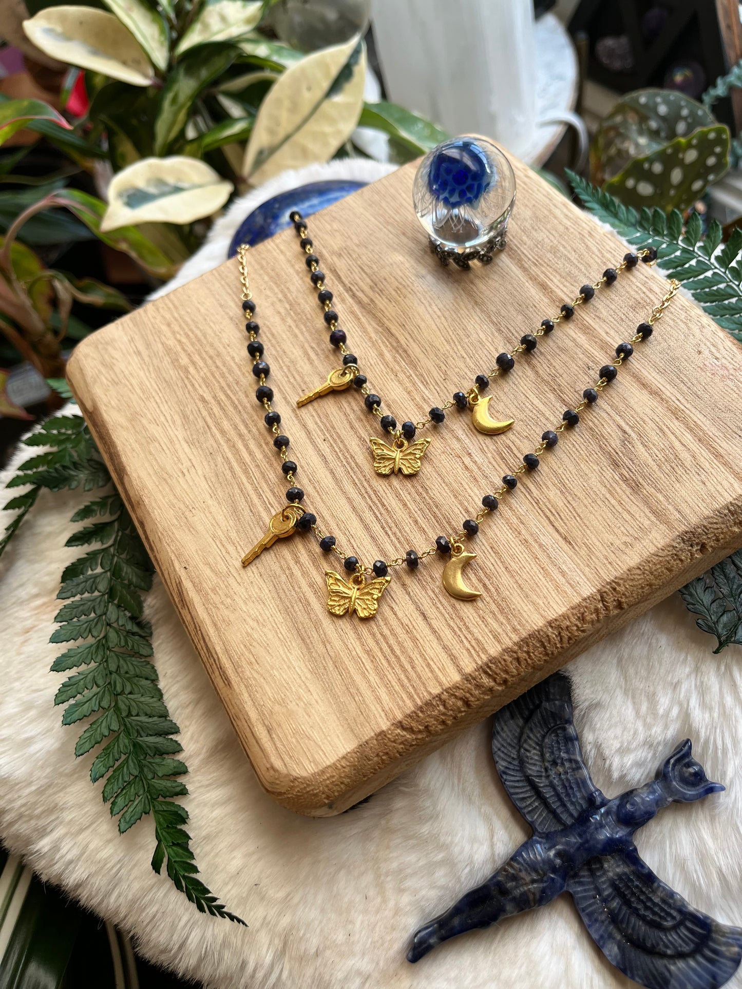 Sapphire & Gold Charm Necklace — Key, Moon & Butterfly