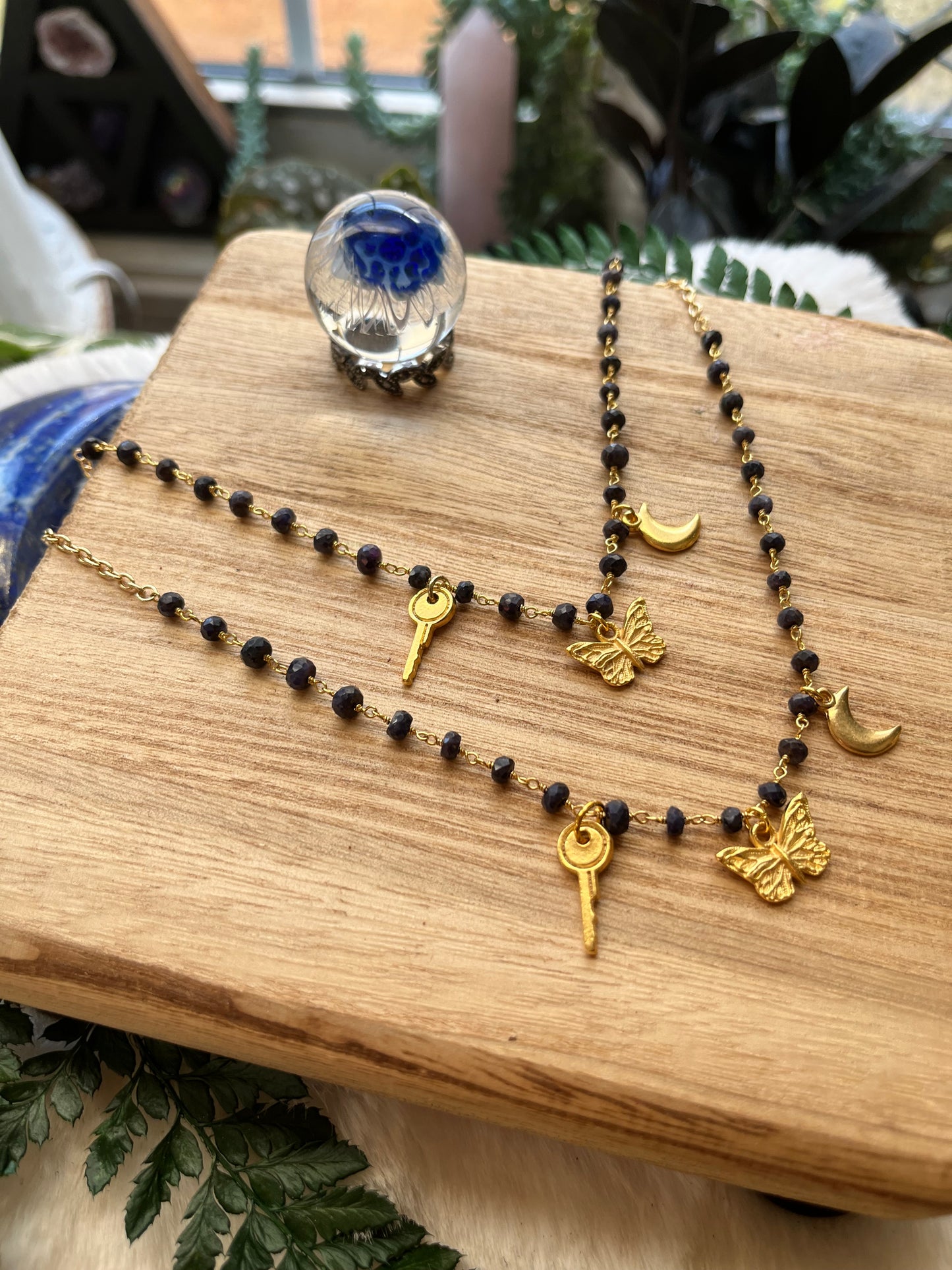 Sapphire & Gold Charm Necklace — Key, Moon & Butterfly